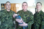 Tpr Sherlock Hubbard (L), Cpl Pascas (C), and Tpr Bolzan with Garrison Pascas, now happily free of his feeding tube